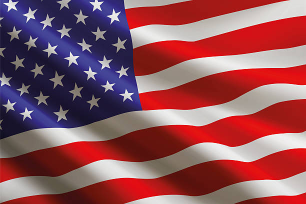 istock United States flag waving in the wind, detailed silk texture 2228624661