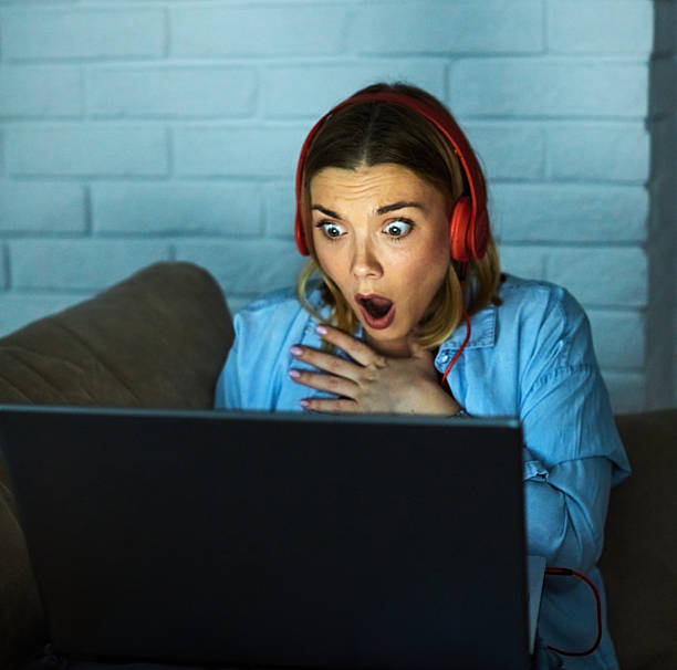 istock woman girl young laptop computer home business work education headphone learning problem surprise expression stress shock trouble emotion worried 2228627729