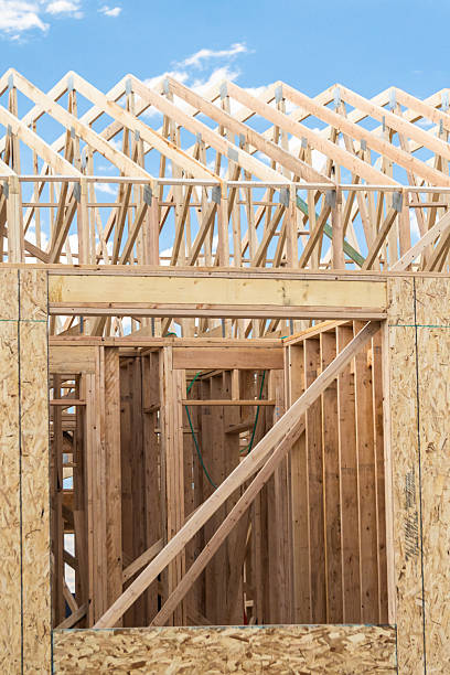 istock Suburban Single-Family House Construction: Framing Stage Progress 2228628107