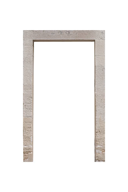 istock Stone door frame with rough texture is isolated. Limestone doorframe. 2228629073