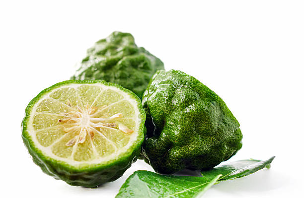 istock Fresh bergamot fruit on white background, close-up 2228630744