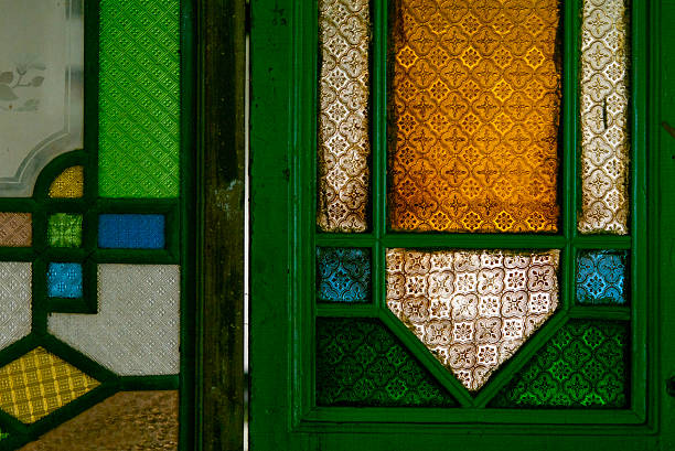 istock Patterned Glass and Green Frame – Traditional Architectural Detail 2228632825