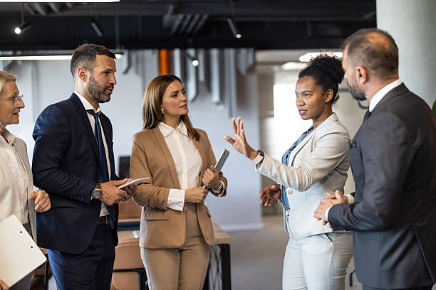 istock Business professionals exchanging insights in a meeting. 2228634008