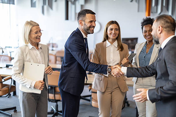 istock Professional team celebrates success in a meeting. 2228634017