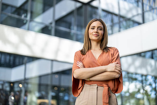 istock Confident female executive posing in a modern office 2228634039