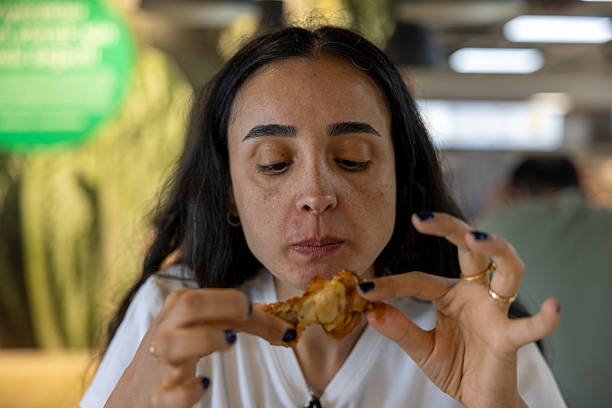 istock close up of eating chicken 2228636132