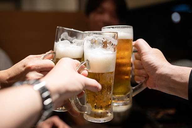 istock Hands of a man toasting with beer 2228638332