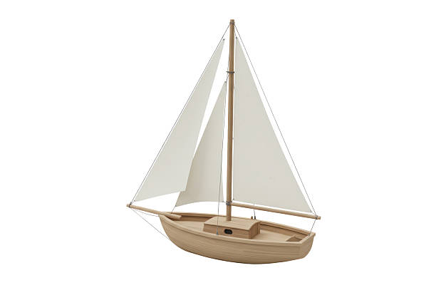istock Isolated Wooden Sailboat Model with White Sails 2228639393