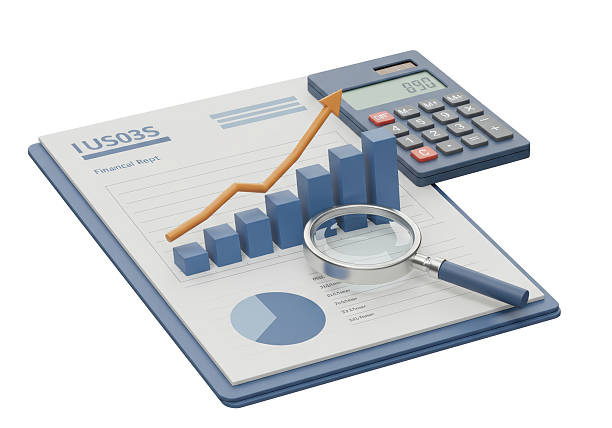 istock Isolated Financial Report with Calculator Magnifying Glass and Graph 2228639441