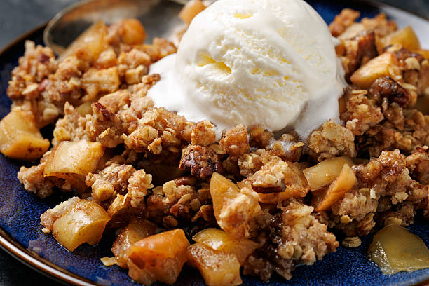 istock Freshly baked apple crumble pie with ice cream 2228640352