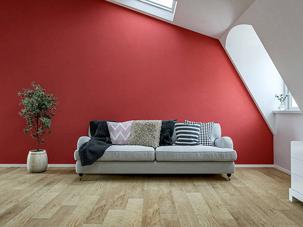 istock Front view of a Bright Scandinavian Loft Interior with Roof windows (skylight), sloped ceiling, Cozy Sofa and Decorative Cushions 2228640517