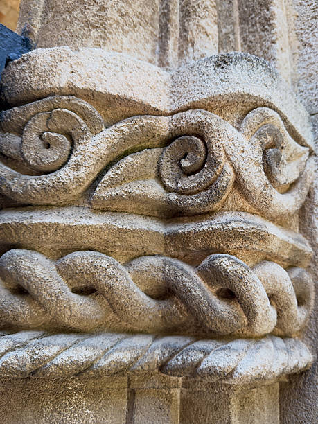 istock Stone column with carved spiral details 2228642310