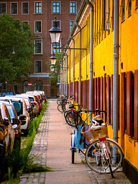 istock Yellow row houses with red shutters line Suensonsgade in Nyboder, Copenhagen, Denmark 2228643477