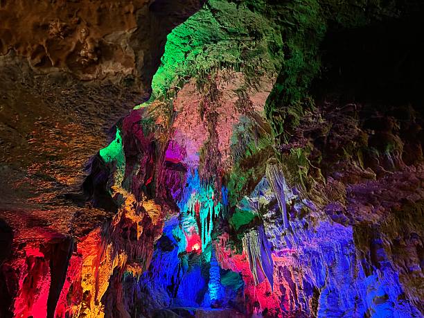 istock Cave formations lit up with a rainbow of colors 2228648238