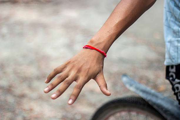 A handsome young man showing style with his fingers.