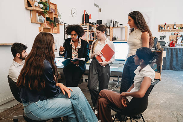 istock Diverse team discussing during a creative meeting in a modern office 2228651001