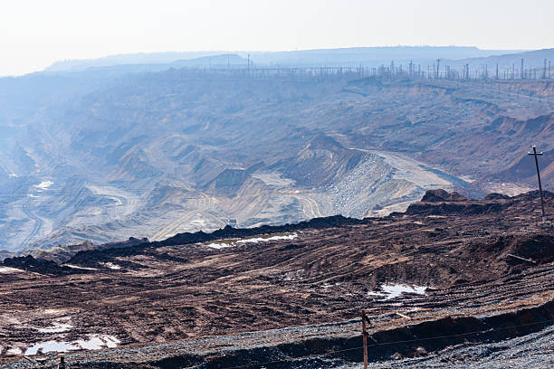 View on iron ore quarry in dust haze