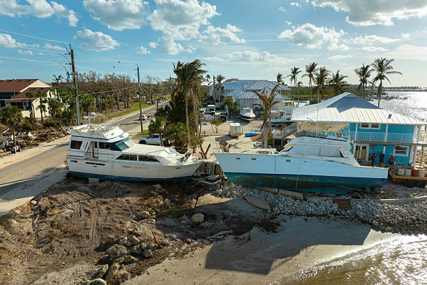 istock Destroyed yachts capsized on shore after hurricane Milton in Englewood, Florida 2228655192