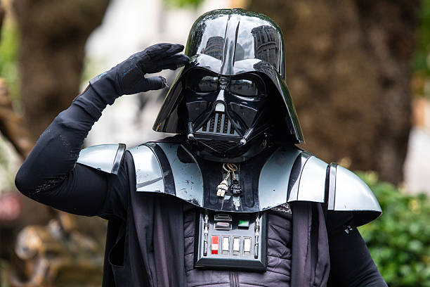 London, UK - July 1st 2024: A street entertainer dressed as Star Wars character Darth Vader in Leicester Square, London, UK.