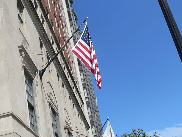 istock American flag on a building 2228657999