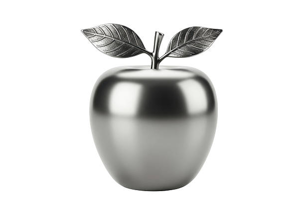 Isolated Metallic Silver Apple Sculpture with Leaves