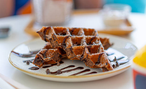 Chocolate Waffles with Syrup on Plate