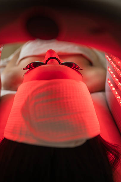 Woman undergoing Hydradermabrasian led light therapy treatment