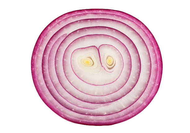 istock Isolated Cross Section of a Red Onion with Concentric Rings 2228665824