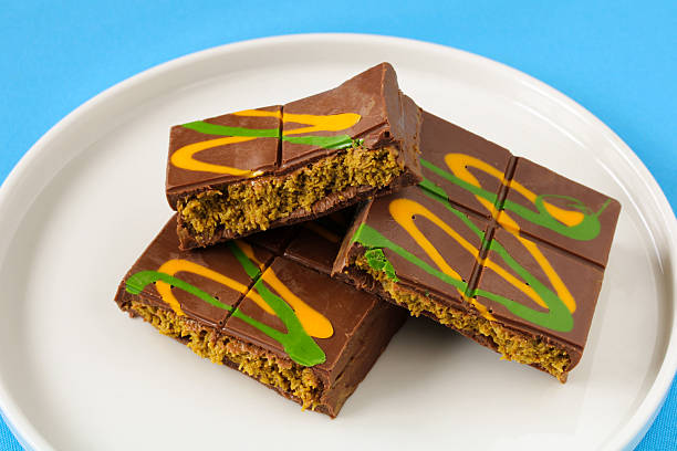 istock Dubai Chocolate bars with matcha filling resting on white plate 2228666136