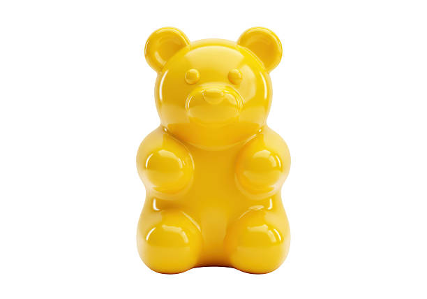 istock Isolated Gummy Bear Sculpture in Gleaming Yellow 2228667615