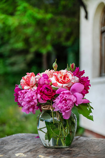 istock Pink peony flowers bouquet in a vase 2228668288