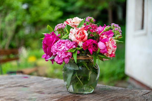 istock Pink peony flowers bouquet in a vase 2228668305