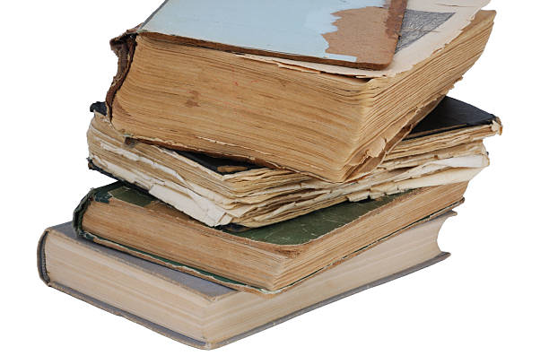 istock stack of old books isolated on a white background. Back to school 2228669907