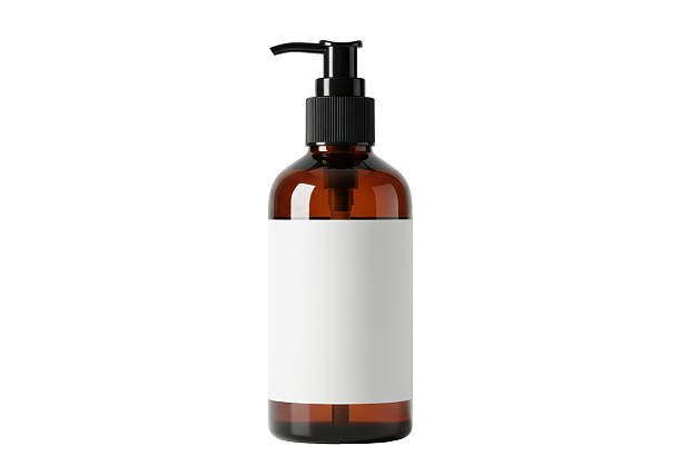 istock Isolated Amber Glass Bottle with Black Pump Dispenser 2228670966