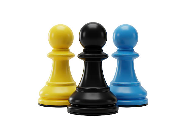 istock Isolated Three Chess Pawns in Yellow Black and Blue 2228671173