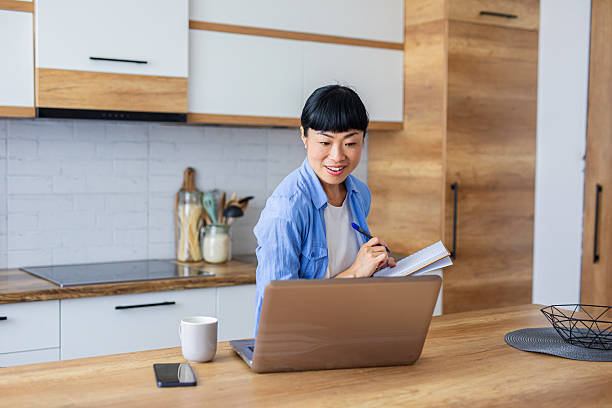 istock Female Planning Monthly Expenses With Tablet and Paperwork 2228677690