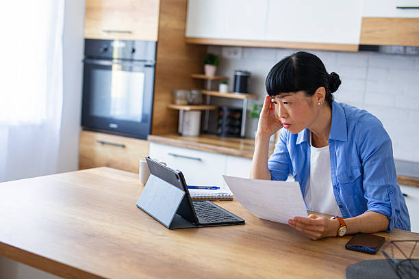 istock Stressed Female Managing Household Expenses Remotely 2228678046