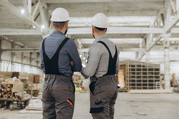 istock Engineers inspecting prefabricated building in factory 2228678151
