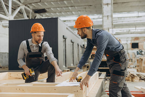 istock Construction workers building wooden frame in modular building industry 2228678234