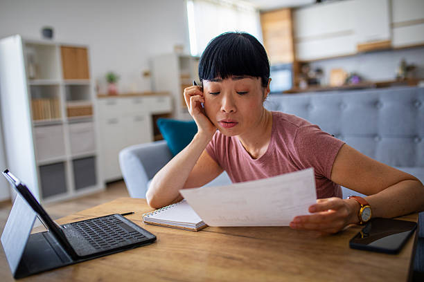 istock Stressed Female Managing Household Expenses Remotely 2228679612