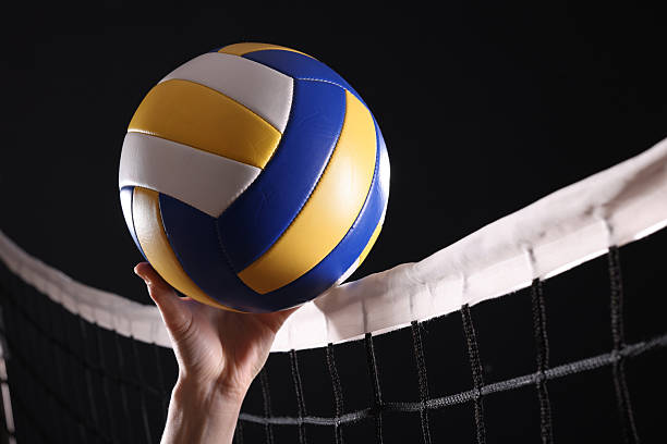 istock Volleyball spike hand block over the net 2228683822