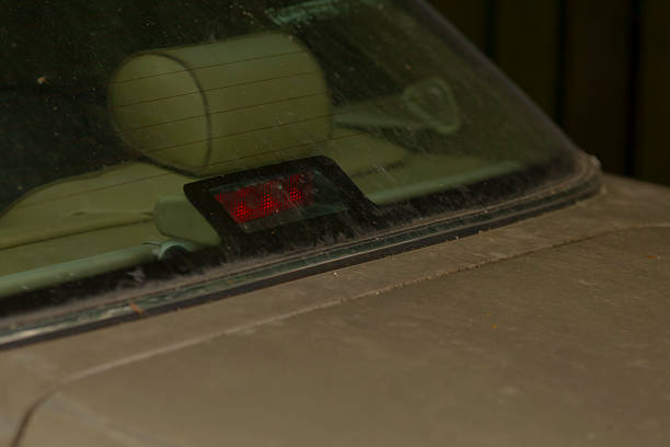 istock A focused view of a cars windshield shows a red light illuminated 2228684717