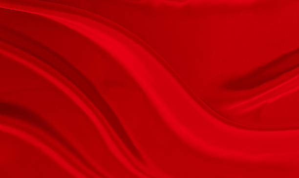 istock Black red satin dark fabric texture luxurious shiny that is abstract silk cloth background with patterns soft waves blur beautiful. 2228684821