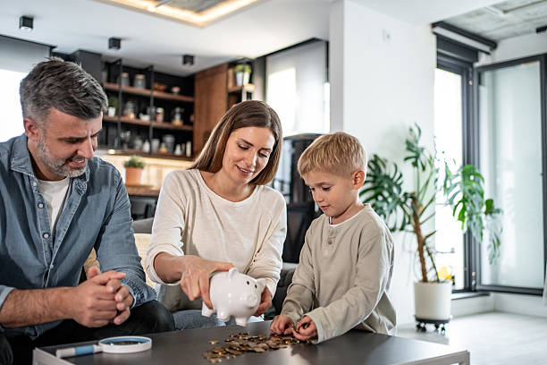 istock Family teaching financial responsibility at home 2228688107
