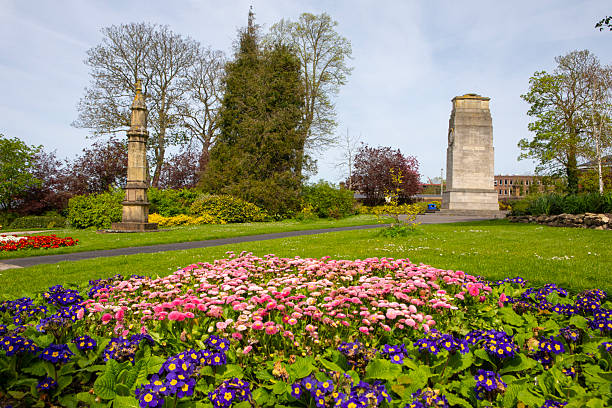 A finial from the House of Commons chamber, located in Brenchley Gardens in the town of Maidstone in Kent, UK. It was recovered from the damage caused by the Blitz in London during WW2. The Cenotaph is in the background.