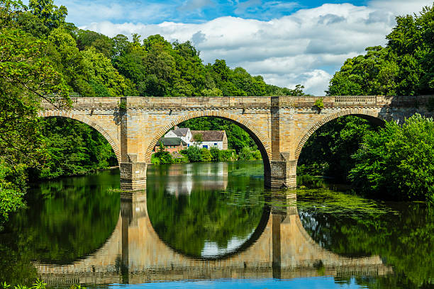 istock Prebends bridge, Durham on a bright sunny july day 2228690650