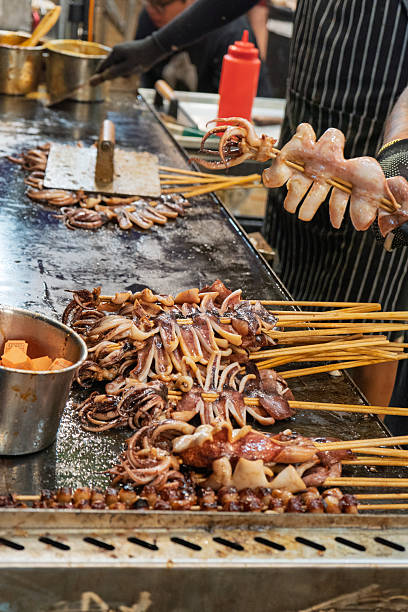 Festival Foods - Frying Octopus on a Stick