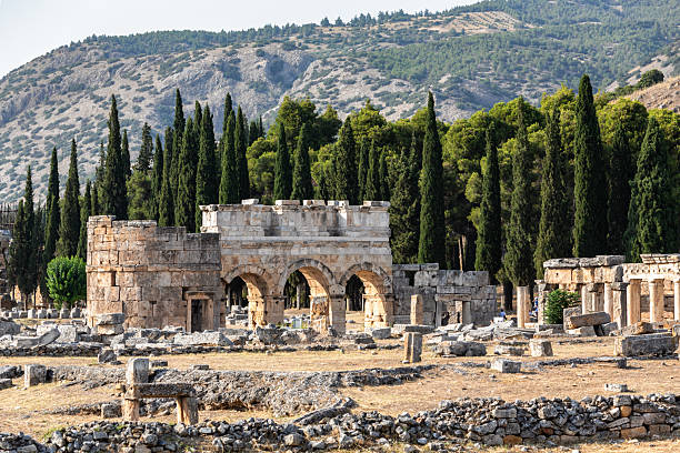istock Frontinus Gate and surrounding ancient ruins at Hierapolis archaeological site, Pamukkale, Turkey 2228696034