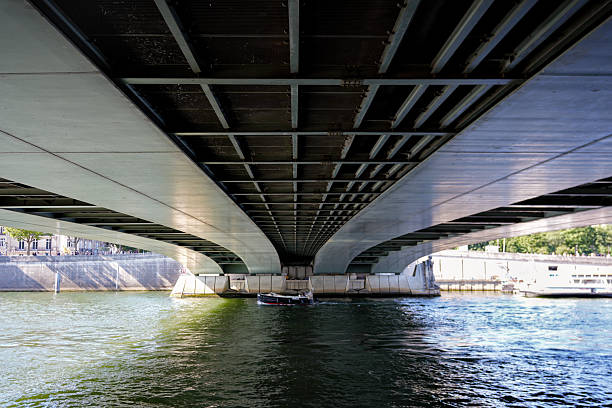istock Underneath modern bridge over Seine River in Paris France 2228697105