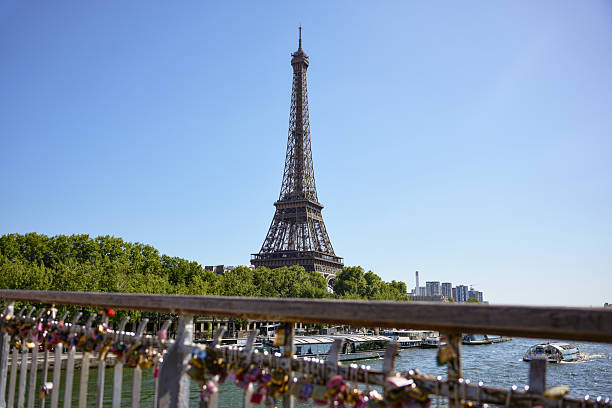 istock Eiffel Tower view behind love locks in Paris 2228699217